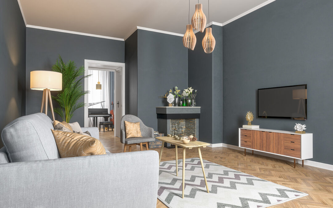 Bright living room with gray walls, a light sofa, a fireplace and wooden pendant lights